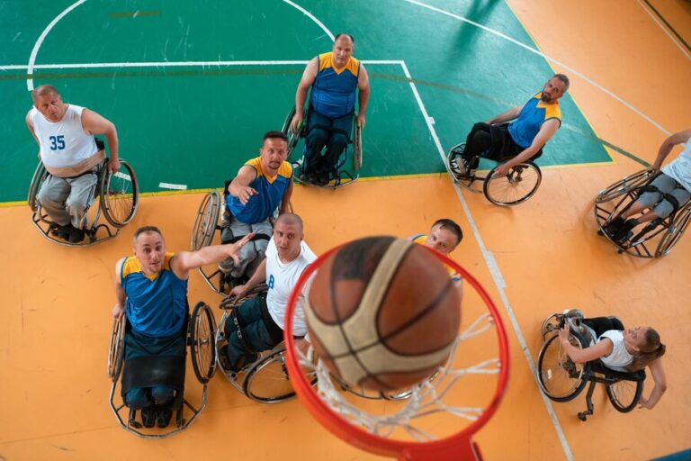 basketball-teams-wheelchairs-handicapped-people-rehabilitation-inclusion-concept-top-view_530697-15